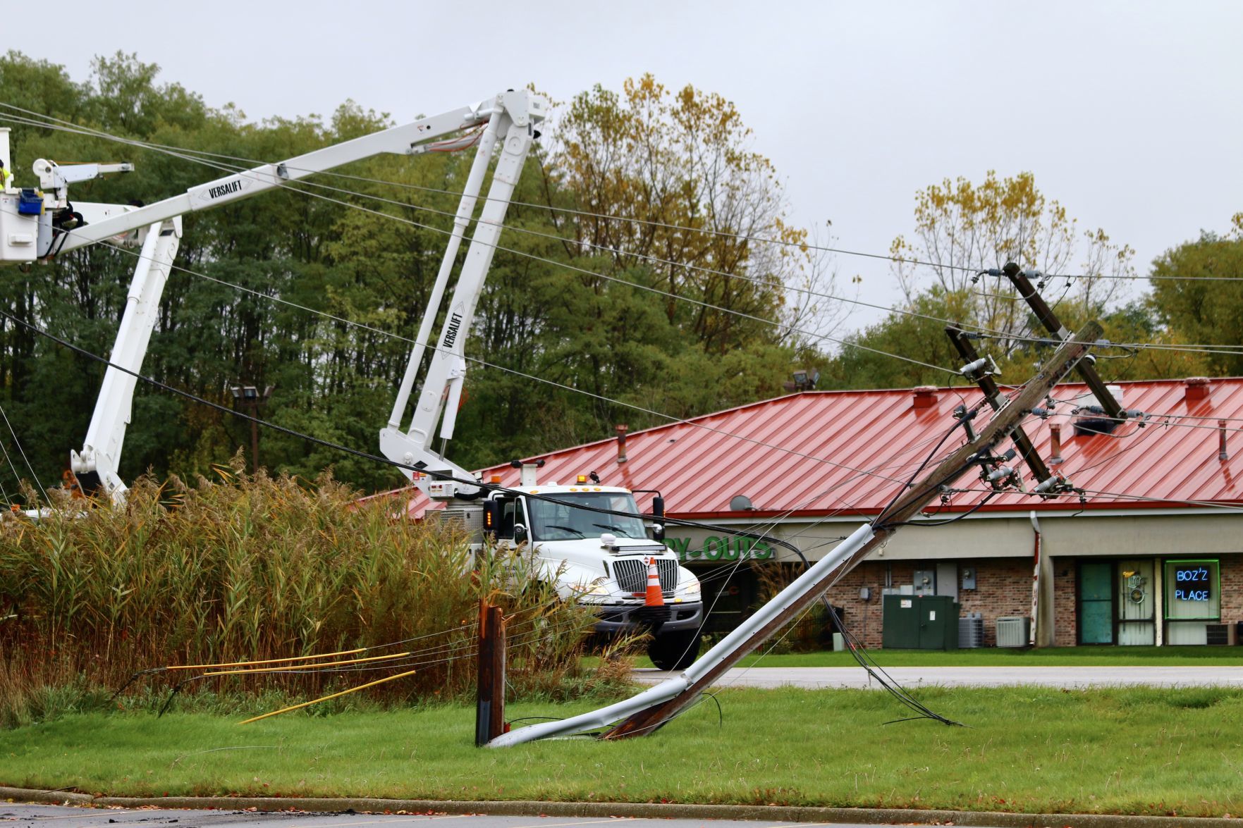 Power poles shear off in chain, knocking out power in Winfield
